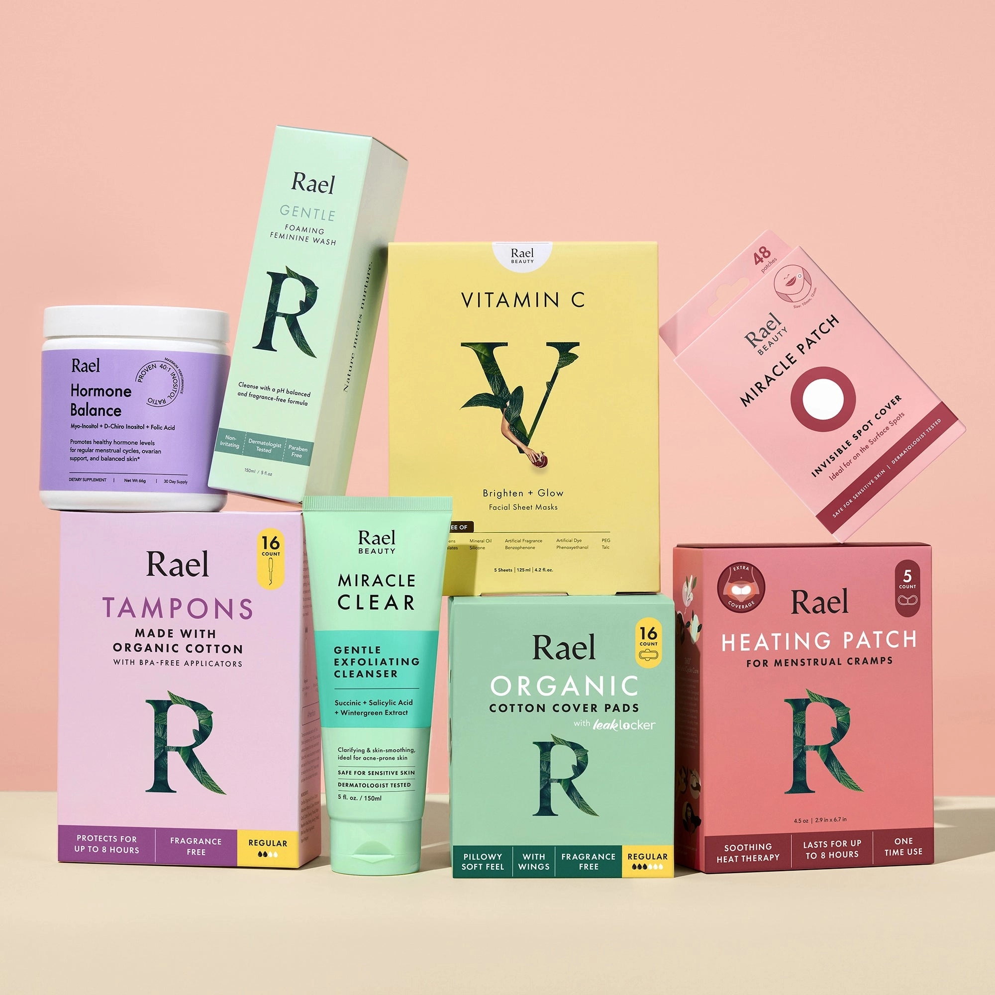 Rael products from skin care to period care arranged together on a peach background